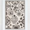 M. Bell 1856 - A Quaker Fancy is partly a reproduction sampler and partly an original cross stitch design by Modern Folk Embroidery